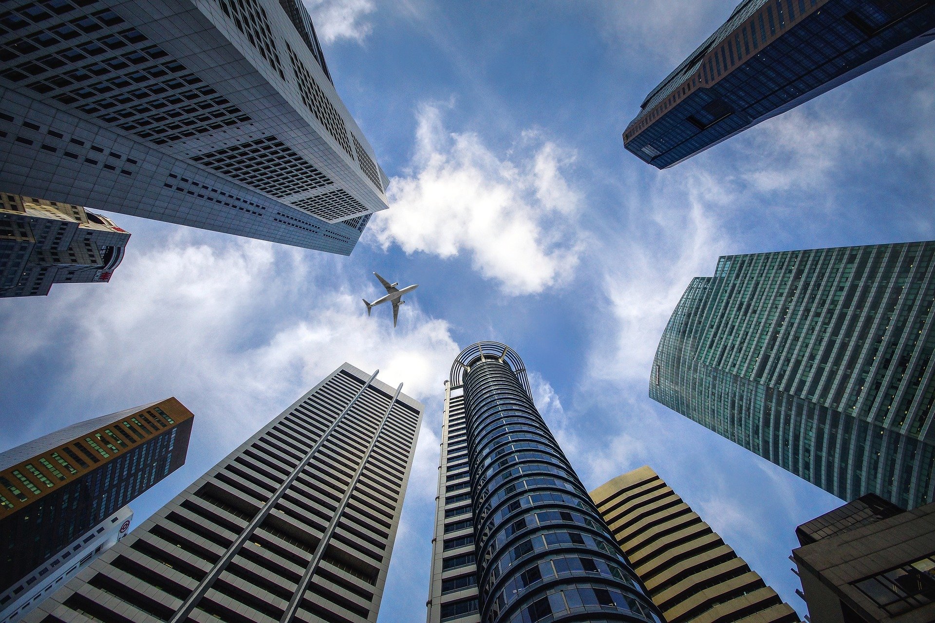 Skyscrapers with aircraft in sight
